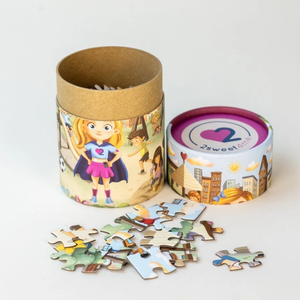 2sweet4me type 1 diabetes superhero girl puzzle with its cylindrical packaging